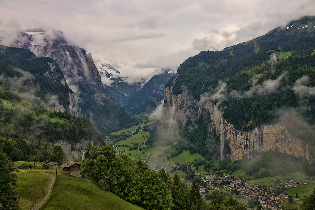 The Lauterbrunnen valley in the Swiss Alps with cliffs on both sides